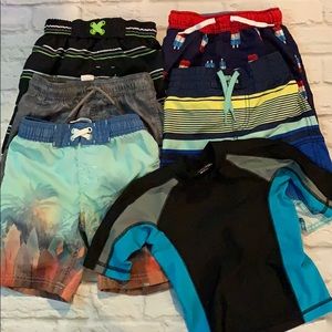 5 prs boys board shorts and 1 rash guard. Sz 4/5